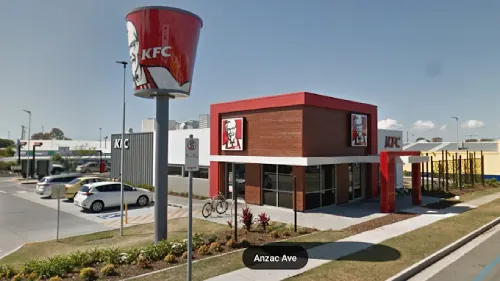 KFC Redcliffe image of the outside of KFC fast food restaurant, including the sign and parking lot