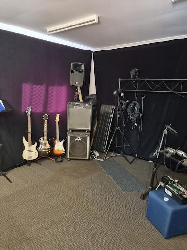 Visit redcliffe qld image of electric guitars, music speakers, and more musical instruments